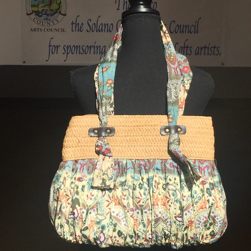 Fabric and grass bohemian handbag